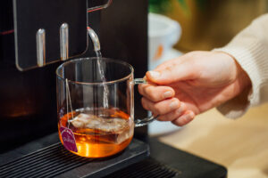 machine à café avec buse d'eau chaude
